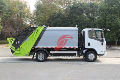 Trash compactor made by Isuzu trucks