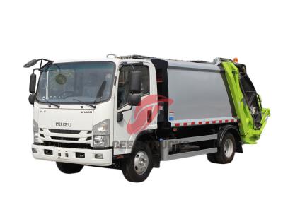 Trash compactor made by Isuzu trucks